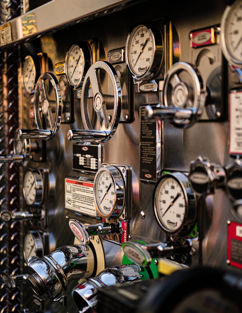 Fire apparatus pump panel with gauges during training